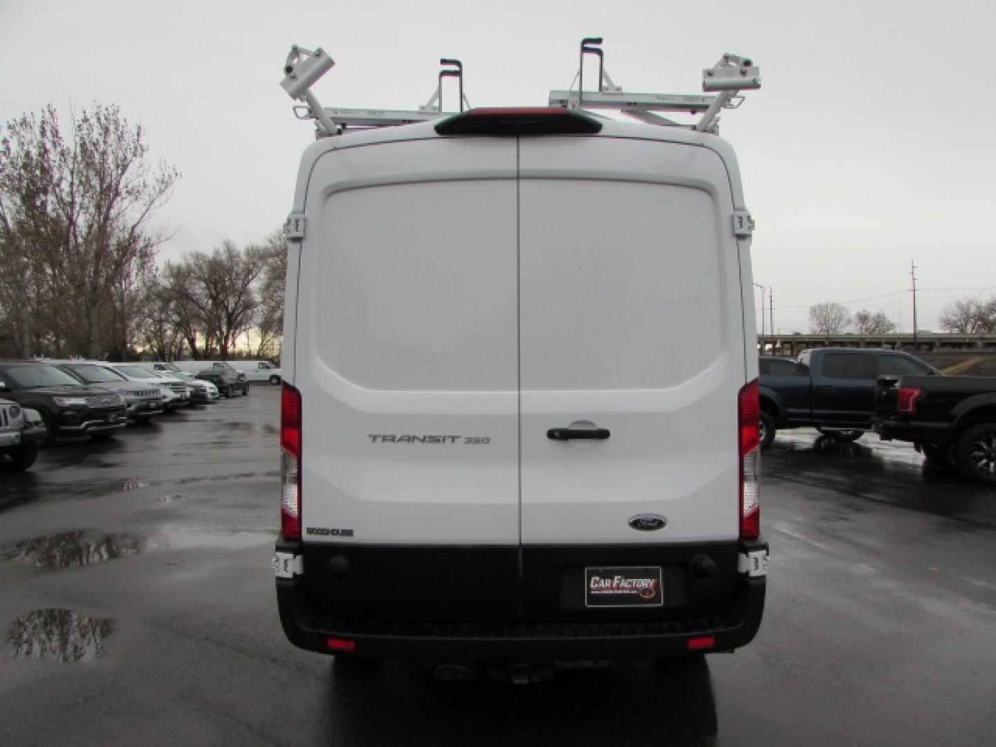 2020 White /Black Ford Transit 350 (1FTBW9C86LK) with an 3.5L PFDI V6 Gas engine, 10 speed Automatic transmission, located at 4562 State Avenue, Billings, MT, 59101, (406) 896-9833, 45.769516, -108.526772 - 2020 Ford Transit 350 Van Medium Roof 148-in. WB Cargo Van - One owner! 3.5L PFDI Gasoline V6 - 10 speed automatic transmission - rear wheel drive - 117,088 miles - One owner - Inspected and serviced - copy of inspection and work performed as well as a full vehicle history report provided Air - Photo#2